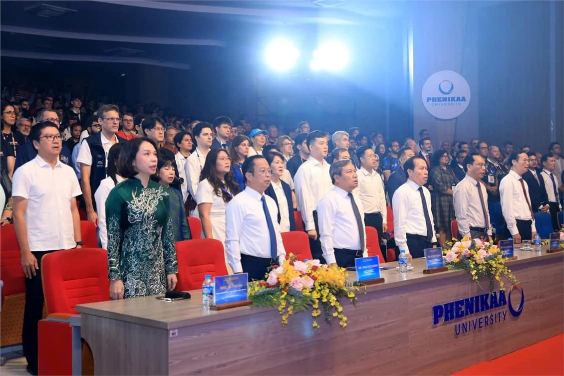 Delegates take part in the flag-raising ceremony at the Opening Ceremony.