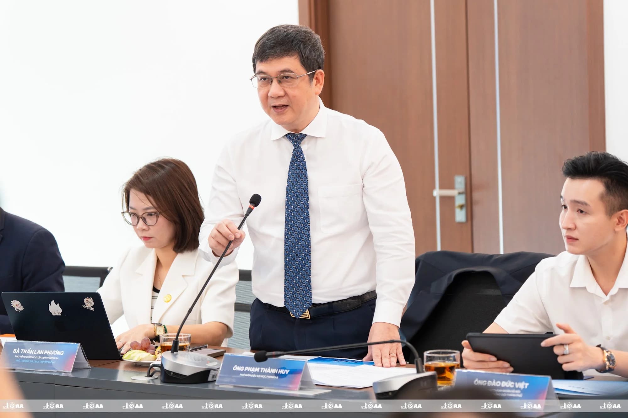 Pham Thanh Huy, Vice President of Phenikaa University, provides an update on infrastructure and technical preparations for IOAA 2026.