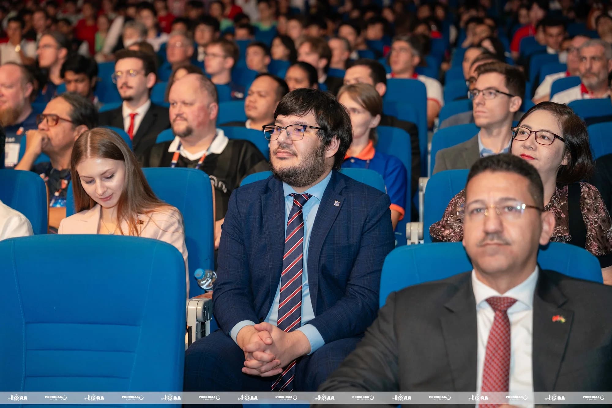 Delegates attend the Opening Ceremony.