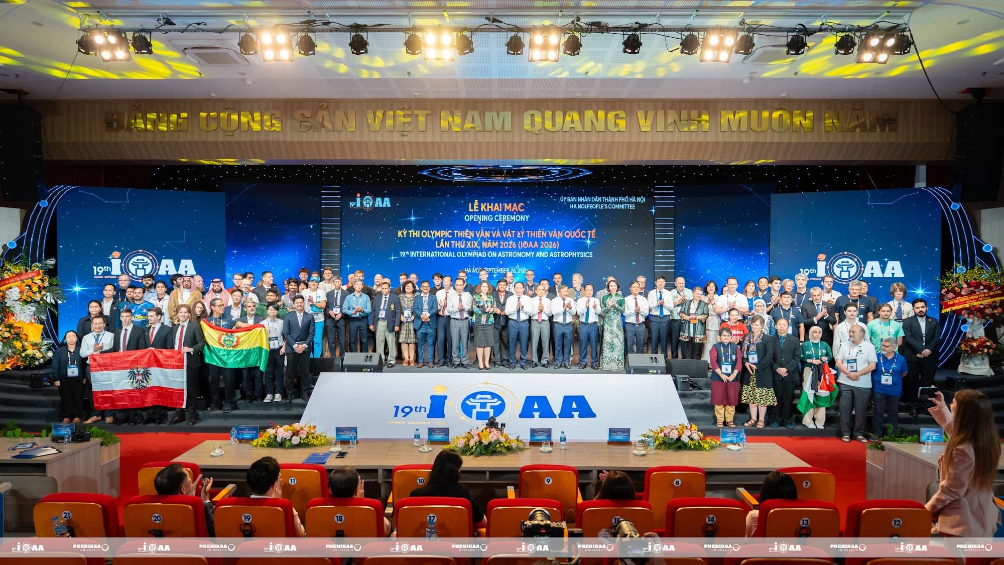 Delegates pose for a commemorative photograph at the Opening Ceremony.
